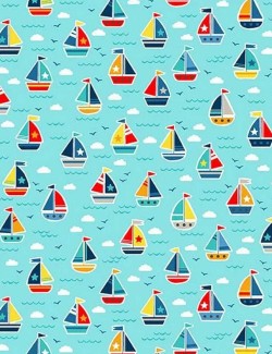 Pool Party patchwork fabric with boats on blue background